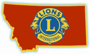 An outline of montana state with the lions clubs logo.
